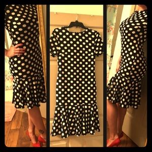 Black/white polka dot dress with peplum style hem